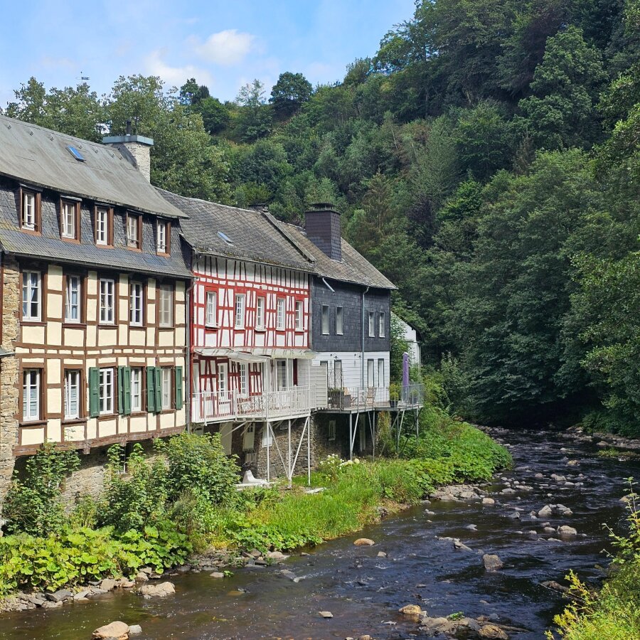 Row of half-timbered houses along the river in Monschau