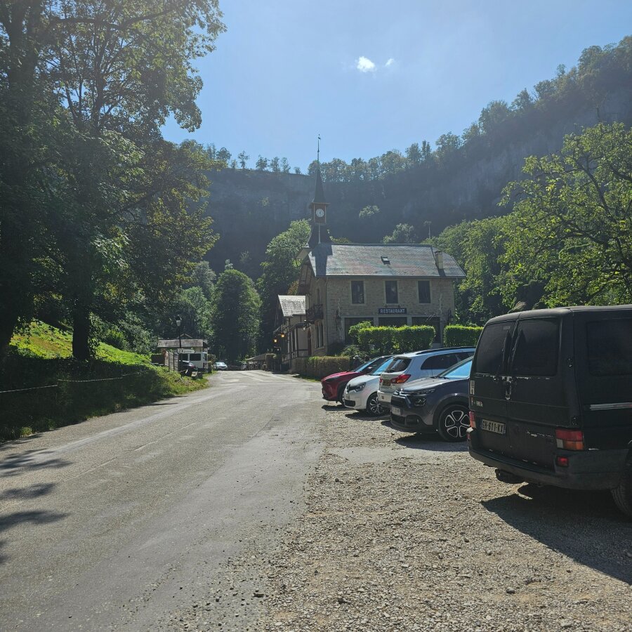 Road with parking in the valley of Baume-les-Messieurs