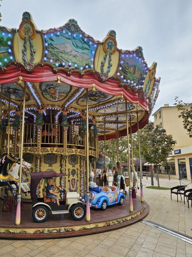 Carousel with horses on a square in Aix-en-Provence