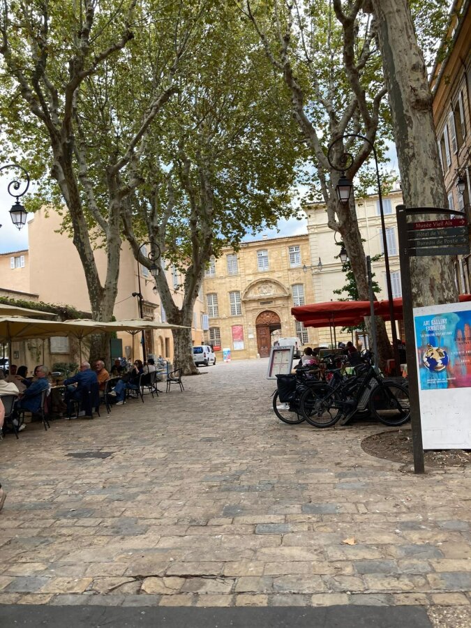 Square with plane trees and cafe terraces in Aix-en-Provence