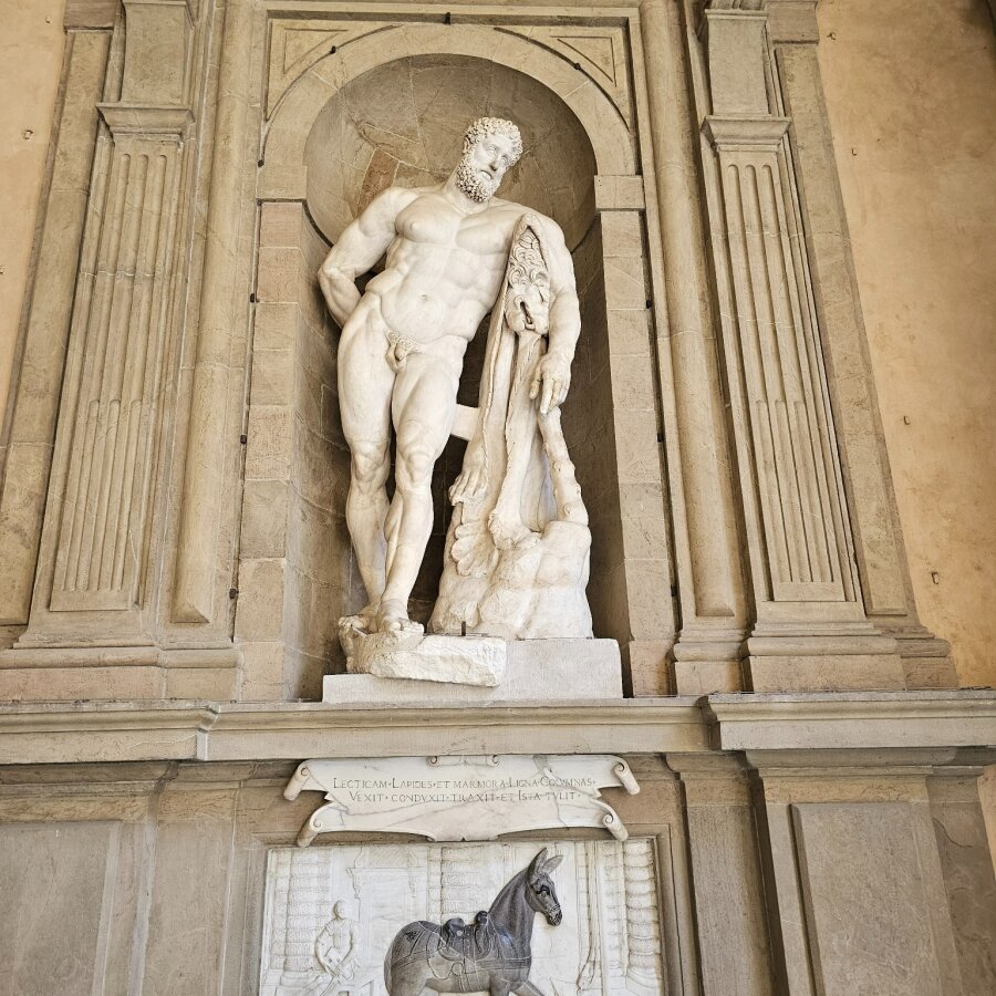 Marble statue in a niche in Florence