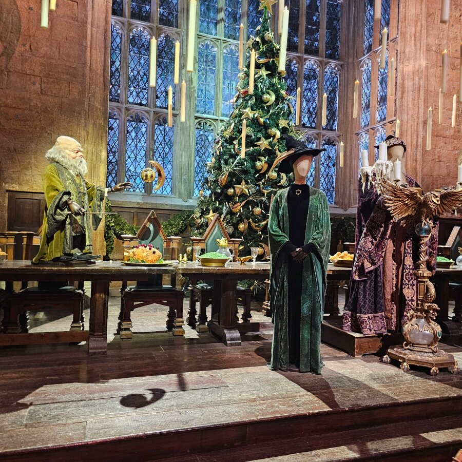 Costumes in the Hogwarts Great Hall at the Studio Tour