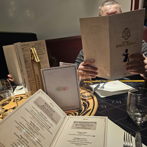 Chez Remy menu cards and table setting at Disneyland Paris