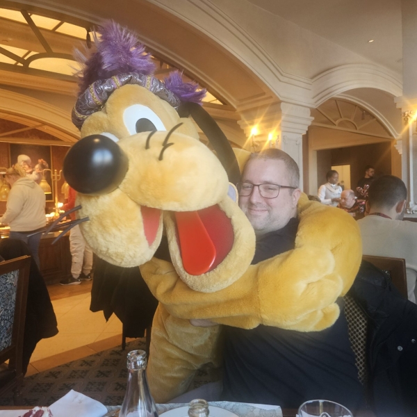 Meeting Pluto at Royal Banquet character dining Disney Hotel