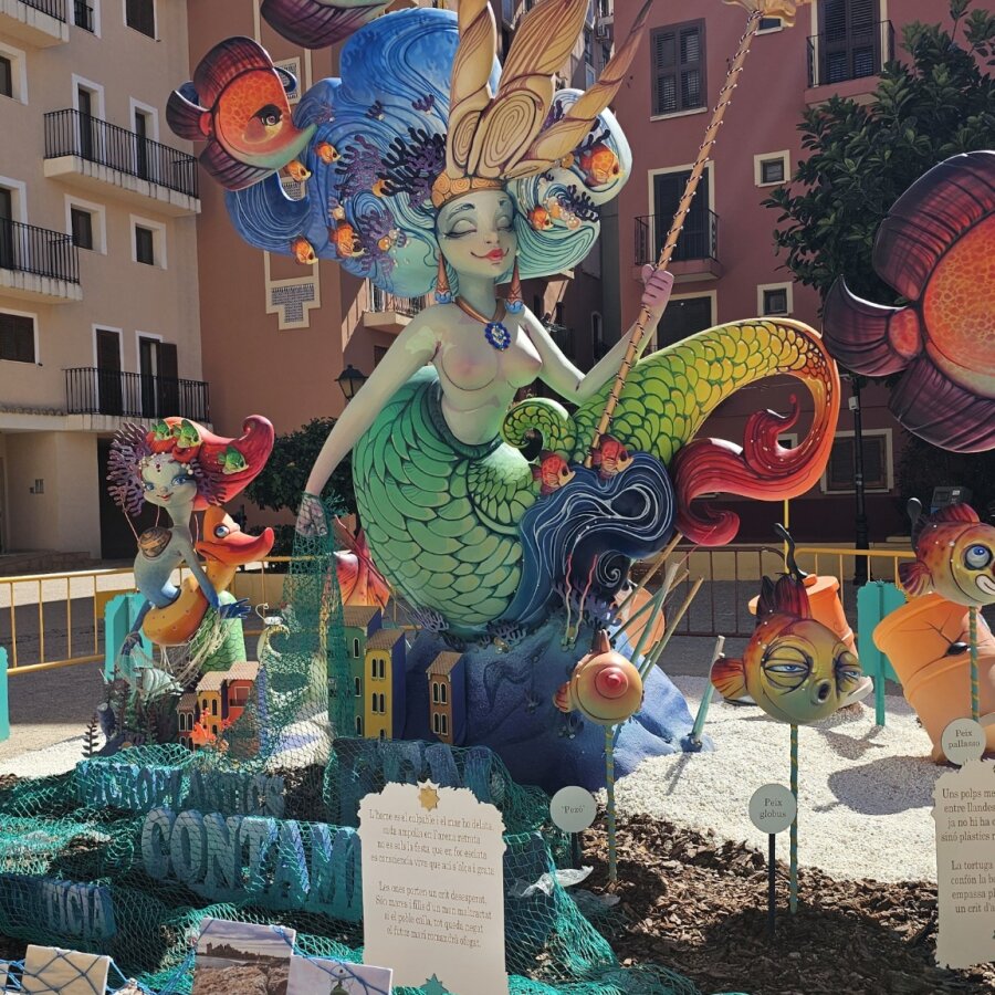 Colourful Fallas sculpture in the street in Port Saplaya