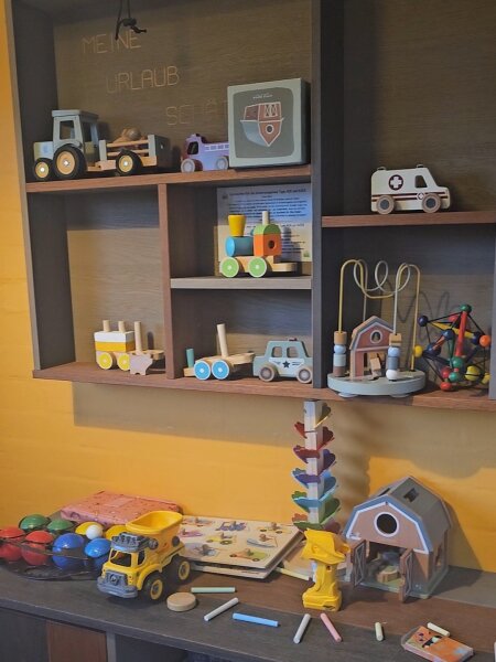 Toy shelf and play table in the children's bungalow at Landal Hochwald