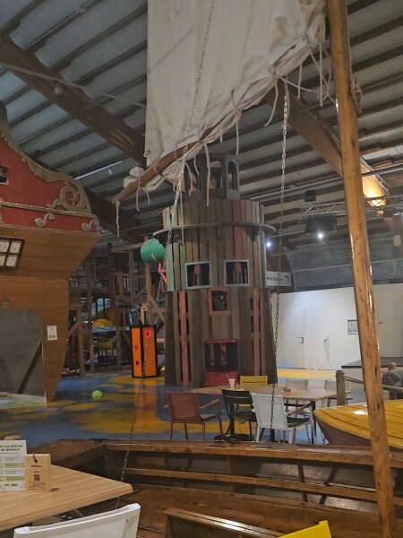 Indoor play hall at Landal Hochwald with a wooden lighthouse and sail